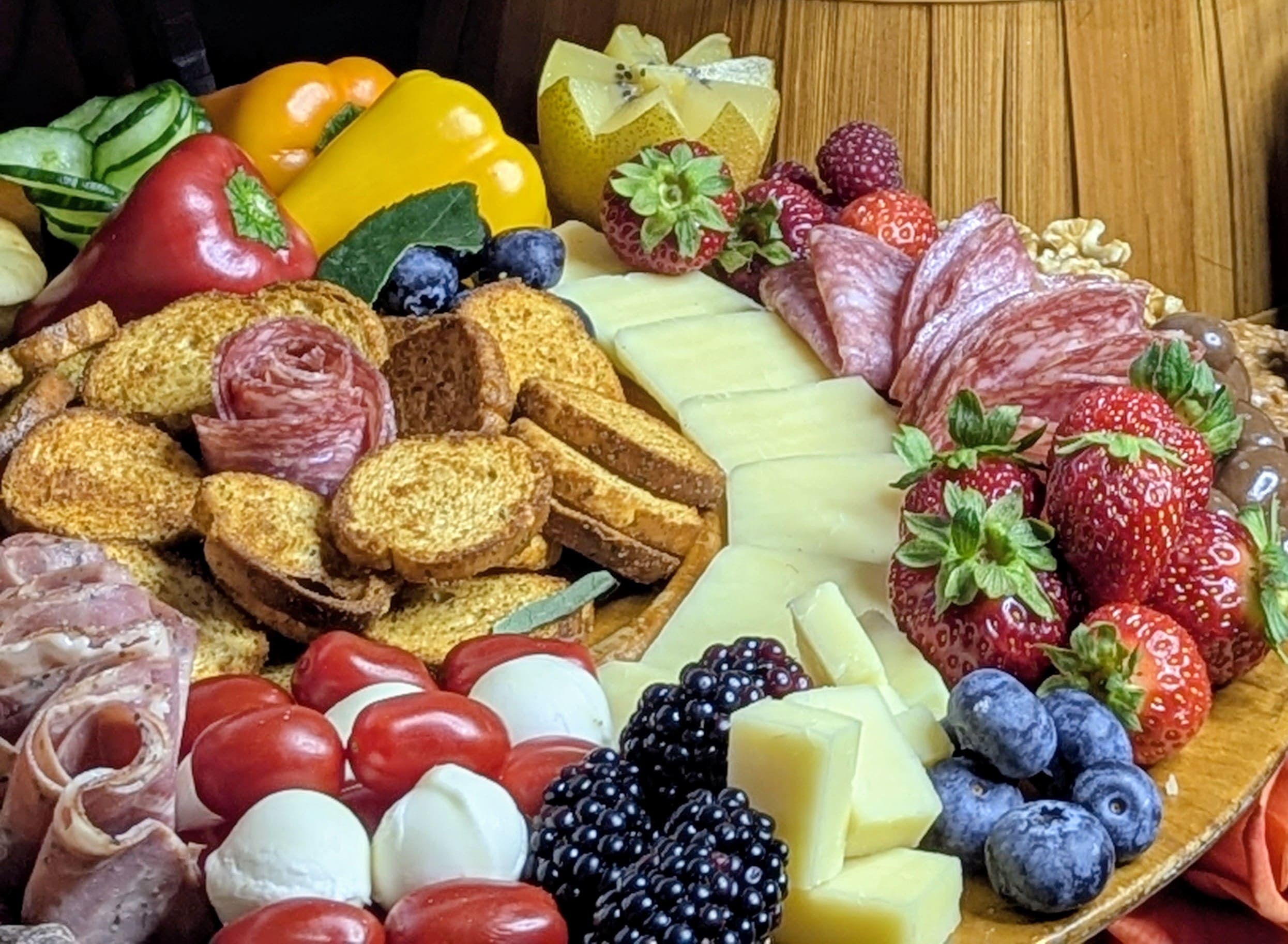 Artisanal charcuterie board with cheeses and fruit